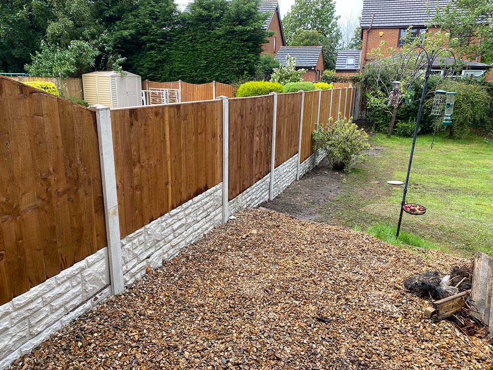 garden and fence with stone base